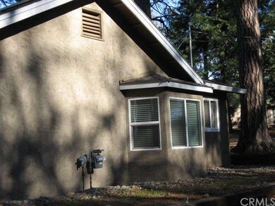West side of home with bay window