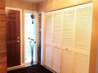 THE LARGE DOUBLE CLOSET ACCENTS THE ENTRY OF THIS 