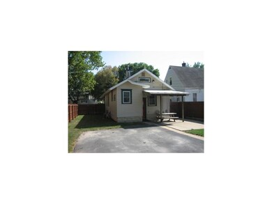 Exterior Back. Covered patio and huge parking pad 