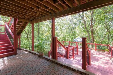 From lower level, walk out onto a covered paver st