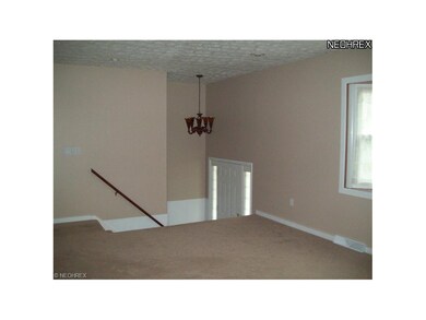 Living room has new bay windoe; new carpet  New li