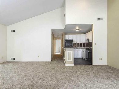 Living Room. New carpet throughout the unit.