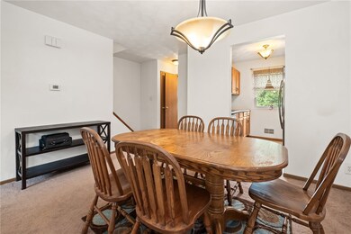 The Dining Room Is Adjacent To The Kitchen