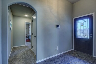 Entry and hall to front 2 bedrooms and hall bath