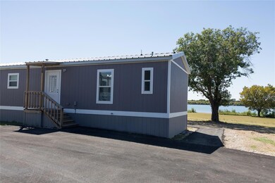 Manufactured / mobile home featuring a water view