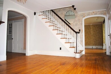the front staircase to the huge...