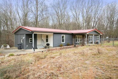 View of ranch home from parking area