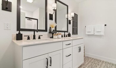 Primary bath with freestanding vanity