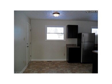 Eating area off kitchen with new 2012 paint & floo