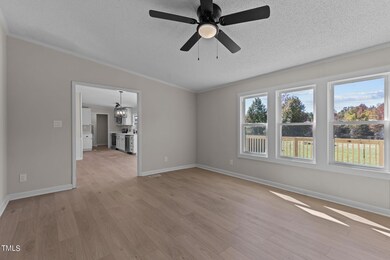Den looking into kitchen