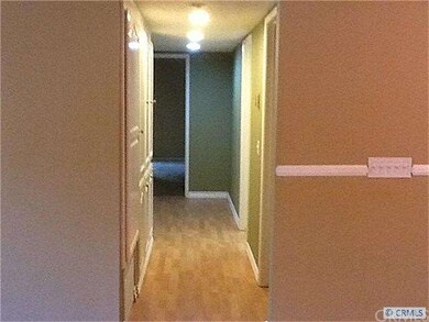 Hallway with lots of storage and Indoor laundry