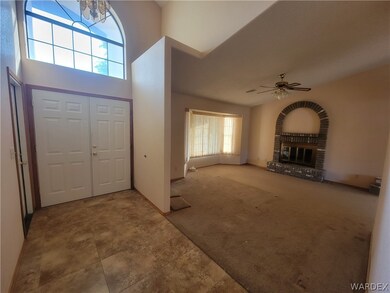 Front Door & Front Room with Fireplace