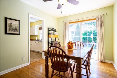 Dining Room - Kitchen to the Left - Sliders to bac