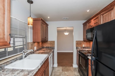 1298 Robbinswood Dr, Rockledge, FL 32955 - photo 7