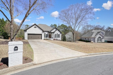 French country style house featuring driveway, an 