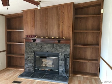 Interior details featuring wood finished floors, v