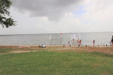 A waterfront community swimming area is located on