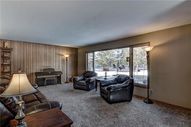 The Spacious living room is filled with light from