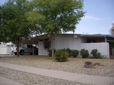 Front of home with rock