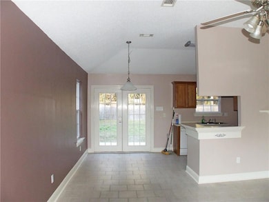 Dining area and Kitchen entrance.