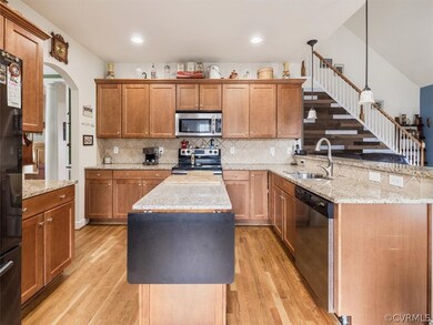 Fantastic kitchen with bar area, granite tops, cen