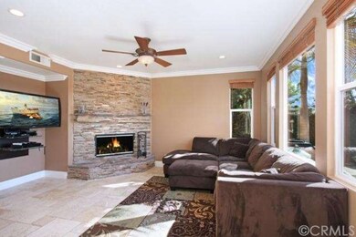 Family room with upgraded fireplace.