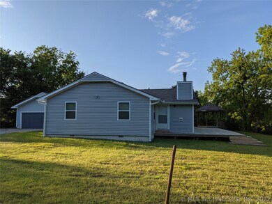Property sits on a hilltop with plenty of lawn aro