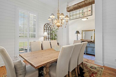 Lovely formal dining with ship lap walls and beam 
