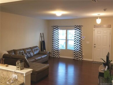 Large living area that opens to spacious kitchen
