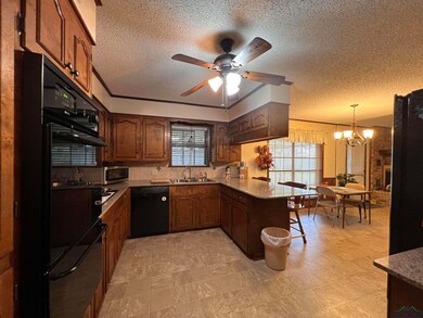 Kitchen with pendant lighting, dishwasher, crown m