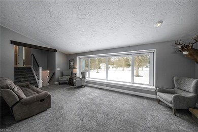 Living Room with Large Picture Window for Plenty o