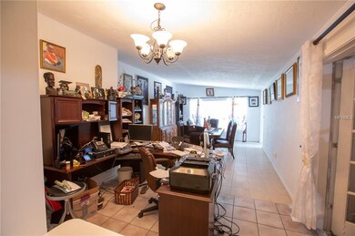 The area currently used for office space is a dining area adjacent to the kitchen.