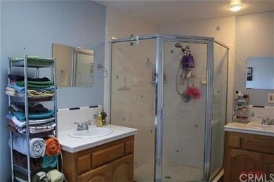 Guest bath has tile floors, a roomy shower, and 2 