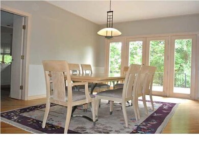 DINING ROOM OFF OF FOYER. DINING AREA HAS ACCESS T