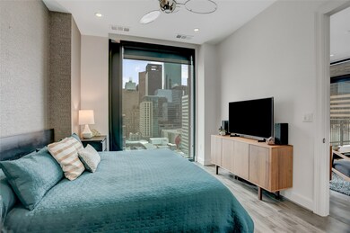 Another view of the primary bedroom highlights its