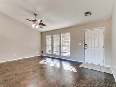 Living room looking at windows