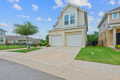 View of front of property featuring stone siding,