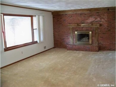 Living Room Warm & Inviting Living Room With A Wood Burning Fireplace
