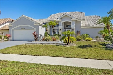 Mediterranean / spanish-style house featuring a ti