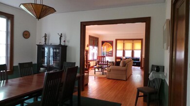 View from dining room into LR & Den