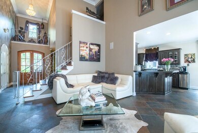 Living area with soaring ceilings.