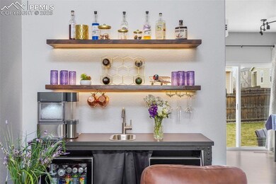 Bar with a sink and indoor wet bar