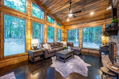 Living room with a wealth of natural light, ceilin