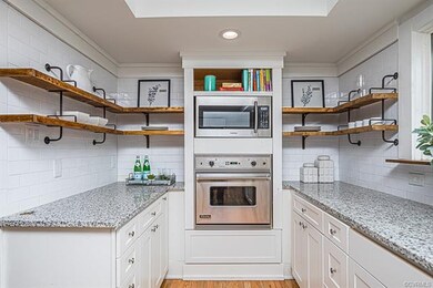 KITCHEN W/ 2 LARGE PICTURE WINDOWS, SS APPLIANCES,
