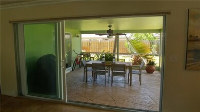 TRIPLE IMPACT SLIDING GLASS DOORS FROM LIVING ROOM