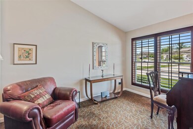 In the front of the home is an office with a NEW (2020) Anderson window covered by Hunter Douglas plantation shutters!