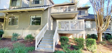 View of front of home featuring a balcony