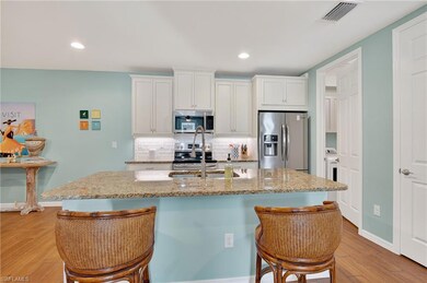 14891 Edgewater Cir, Naples, FL 34114 - photo 6