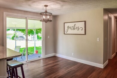 The dining room has sliding doors to the patio.