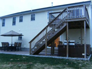 Exterior Back. Deck off dining area,Sliders from l
